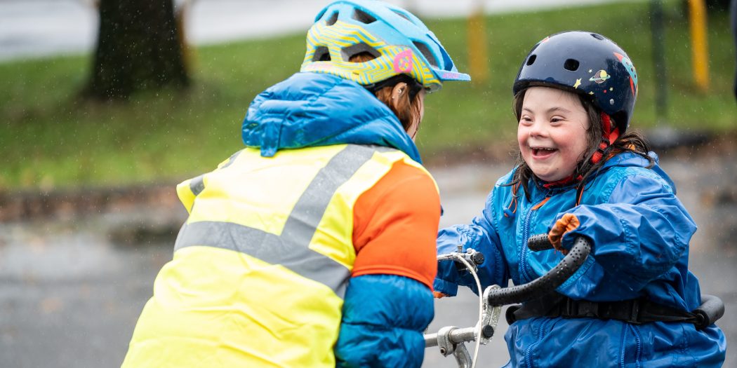 Bikeability kendal, instructor with child cycling