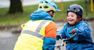 Bikeability kendal, instructor with child cycling
