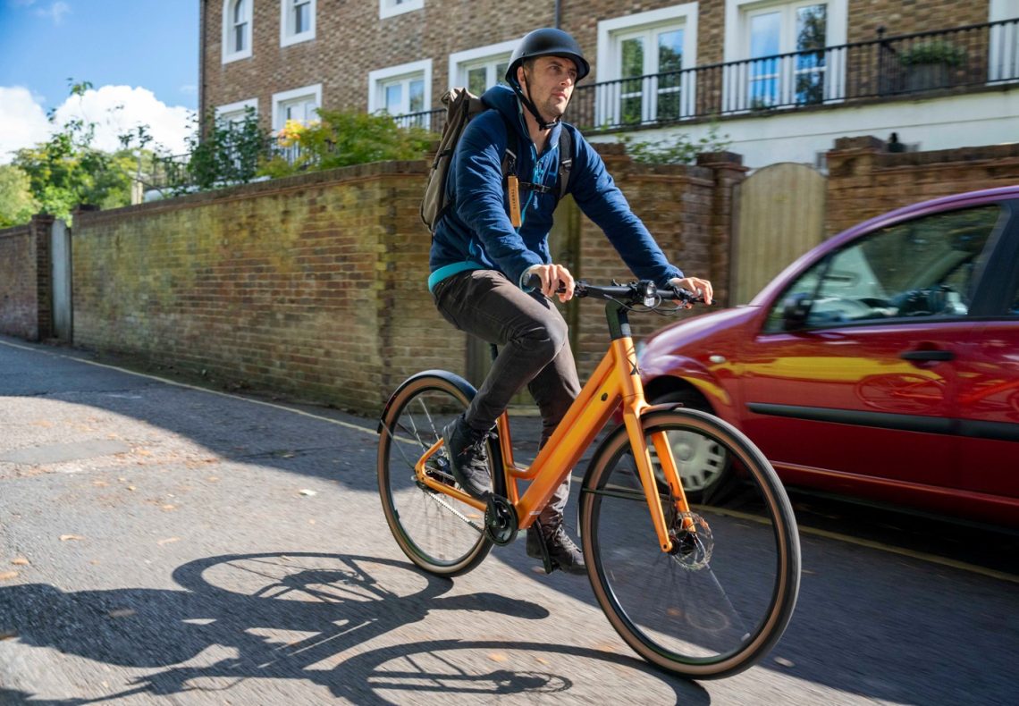Mark Sutton riding an orange estarli