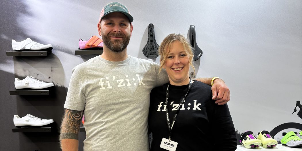 Hannah Wilson and colleague at a cycling event with fizik product