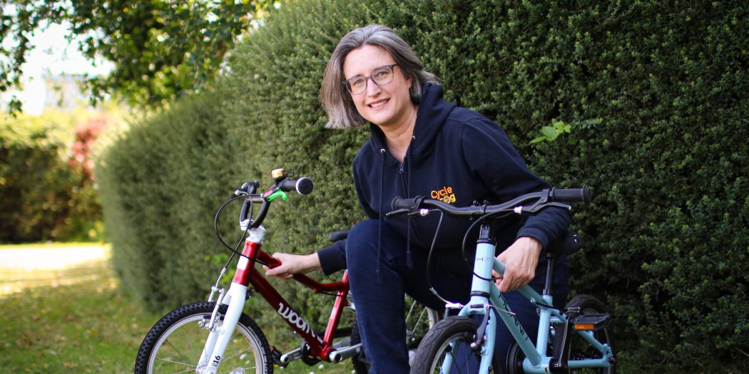 Karen Gee with 2 kids bikes - landscape hero