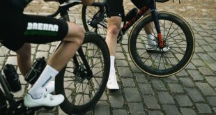 Lightweight Close up of wheels fitted to bike riders paused on cobbles Lightweight launch the new Fernweg Evo Pro wheelset