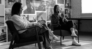 Rachael Burnside, Shift Active media hosting an Uplift event, talking on stage
