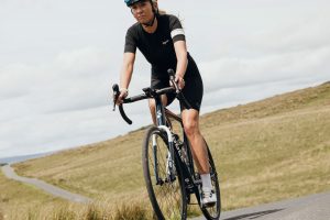 Ribble Allroad woman on bike on moorland road Ribble launches the Allroad AL and Allroad E AL