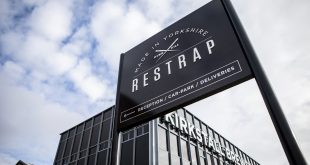 Restrap workshop signange outside industrial building