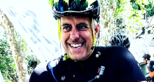 A picture of Chris Hewings with a bicycle helmet on a ride